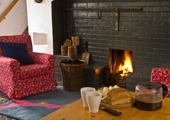 Traditional Irish turf fire, soda bread and a cuppat at the Old Deanery Cottages, Killala.